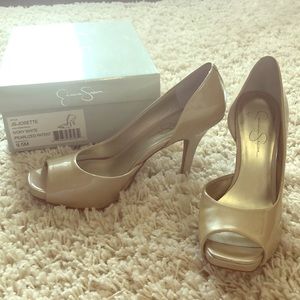 Ivory pearlized patent pumps